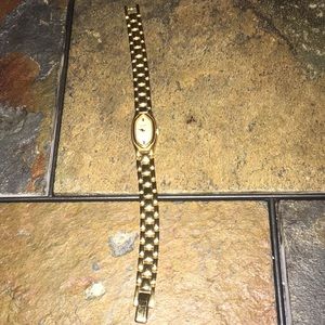 Pulsar gold dress watch.